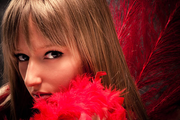 istock graceful woman with red plumage portrait 91831603