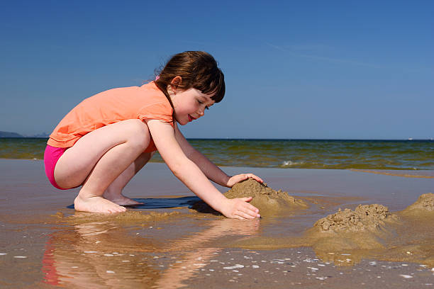 istock Kids on the beach to make sandcastles 91831668