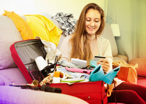 istock Female paying by credit card in internet store 918321686