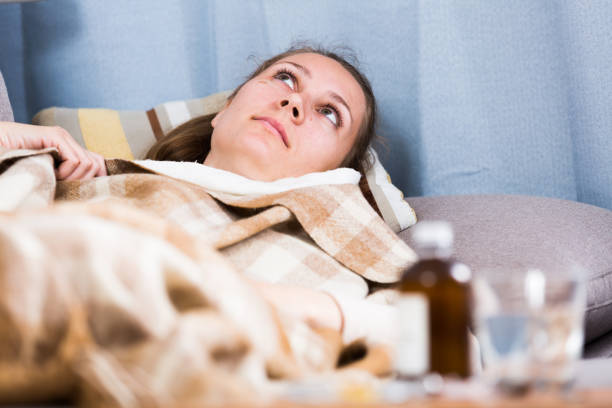 istock Woman being ill 918321778