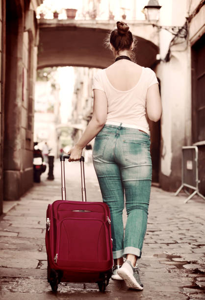 istock inquisitive tourist woman taking a walk 918321988