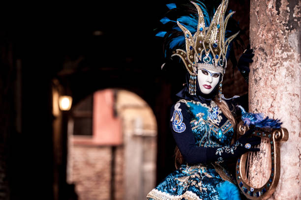 istock Attractive Female Posing in Venice Carnival Costume 918322526