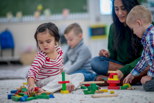 istock Girl With Building Blocks 918335894