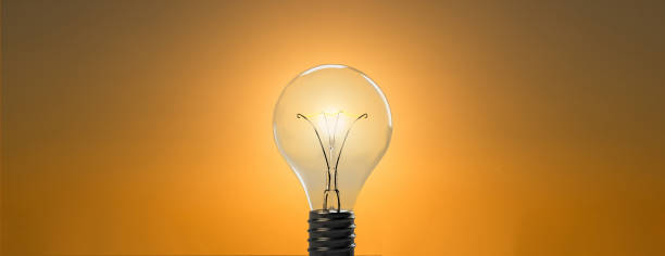 istock A transparent light bulb illuminating the orange sky 918340364