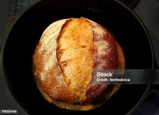 Homemade Sourdough Bread In Black Pan Stock Photo - Download Image Now - Baked, Bakery, Baking