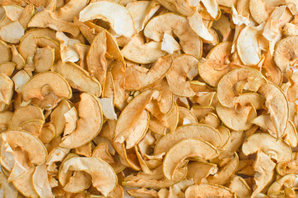 dried slices of apples - dried apple imagens e fotografias de stock