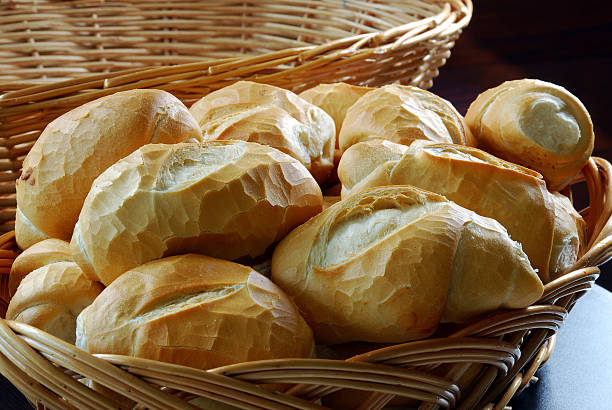 Bread Basket of French bread loaf of bread stock pictures, royalty-free photos & images