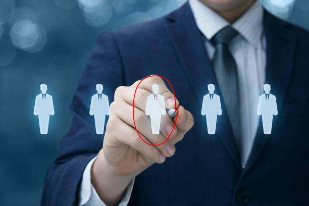 istock Businessman chooses the employee . 918366202