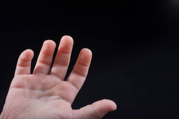 istock Five  fingers of a human hand partly seen in view 918367938