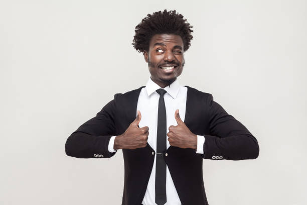 istock Happiness businessman looking at camera and thumbs up. 918377324