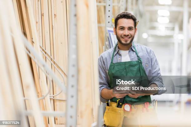 Confident Man Working In Lumber Yard Stock Photo - Download Image Now - Hardware Store, Store, Occupation