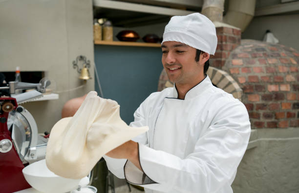 istock Chef making pizza at an Italian restaurant 918377660
