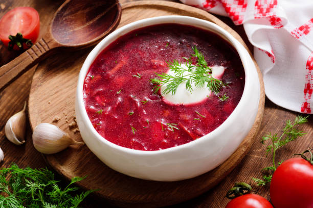 istock Borscht soup in white bowl with sour cream 918381762