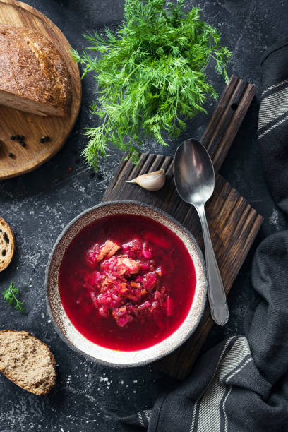 istock Beet soup Borscht in bowl on stone background 918381834