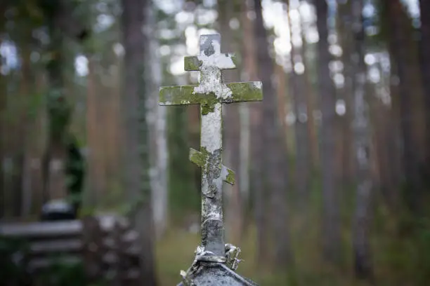 Photo of Old rusty metal Christian cross
