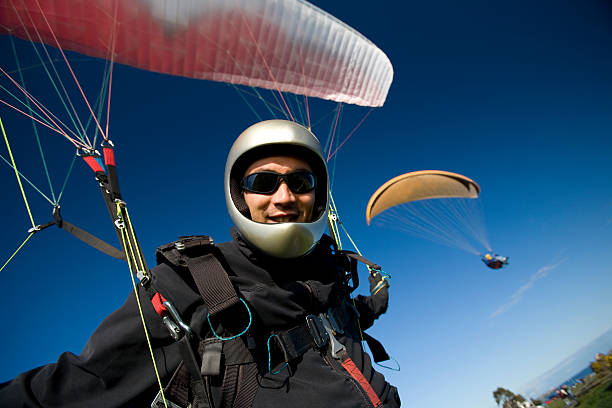 Paragliding Pilot  paraglider stock pictures, royalty-free photos & images