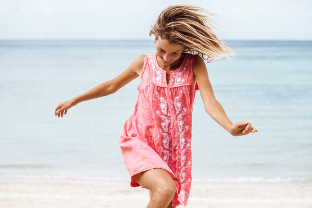 Cheerful laughing woman on the beach