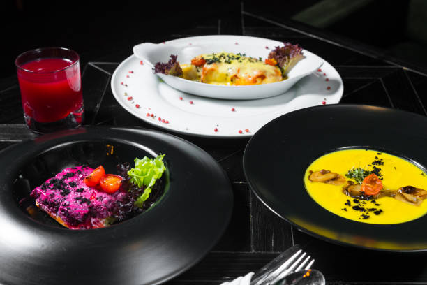 istock Set dinner of three courses. Chef's specialty presented in restaurant on served table. Clouse up. 918396270