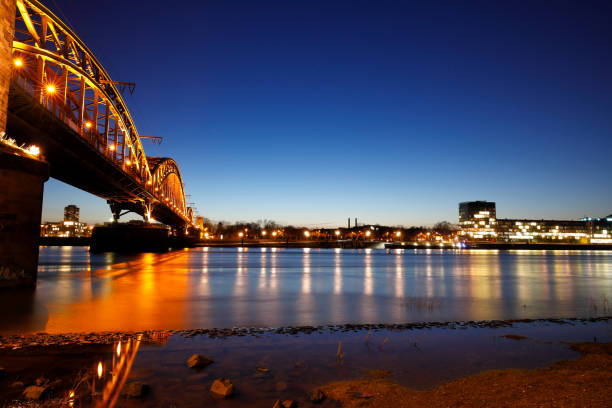 istock Illuminated South Railway Bridge at night, Cologne, Germany 918396844