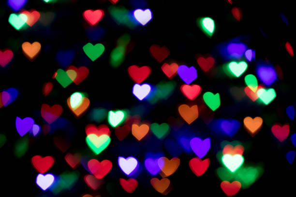 istock colorful heart bokeh background. Valentine's day background 918399482