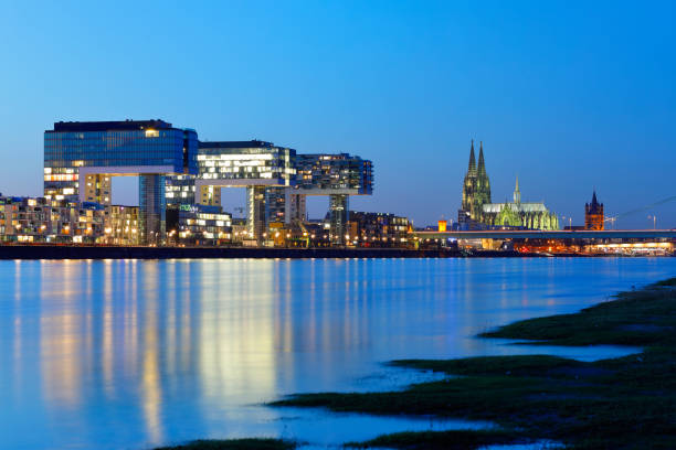 istock Cologne Cathedral and Rheinauhafen at night, Cologne, Germany 918399610