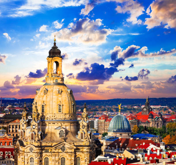 istock landmarks of Germany - beautiful baroque Dresden over sunset 918400144