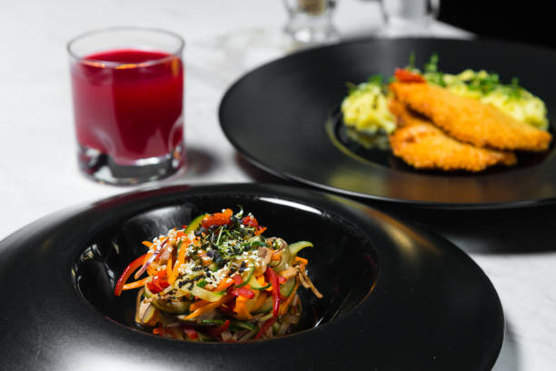 istock Set dinner of two courses. Chef's specialty presented in restaurant on served table. Clouse up. 918400390