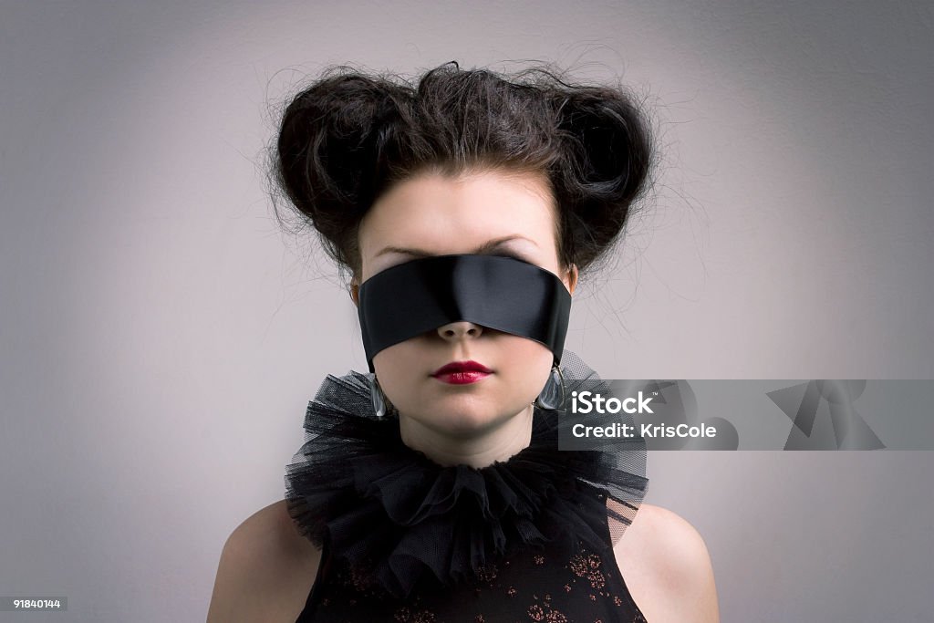 Giovane bella ragazza in un'immagine di un Themis - Foto stock royalty-free di Adulto