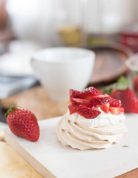 istock small meringue Pavlova dessert with strawberry 918402856
