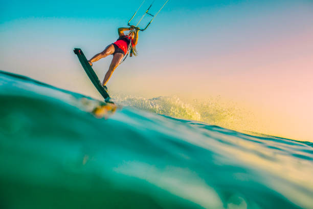 istock Female kiteboarder about to jump 918406034