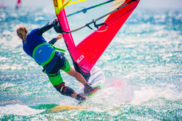 istock Rear view of windsurfer at sea 918407198