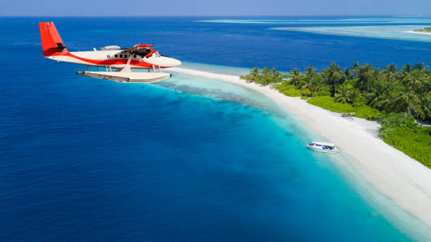 istock Seaplane flying above exotic iceland in Maldives. 918407430