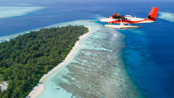 istock Seaplane flying above exotic iceland in Maldives. 918409292