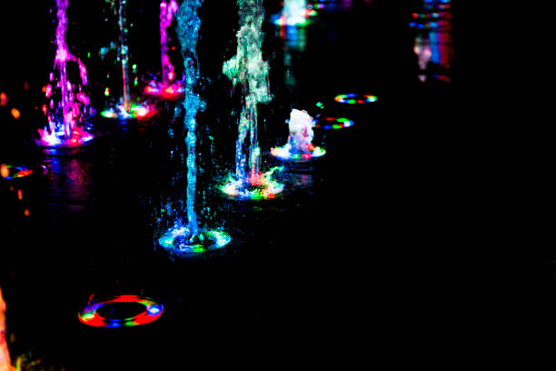 istock abstract art from fountain water with LED light 918410688
