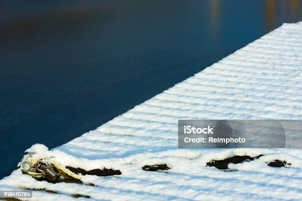 Snow Covered Pier Stock Photo - Download Image Now - Backgrounds, Beach, Coastline