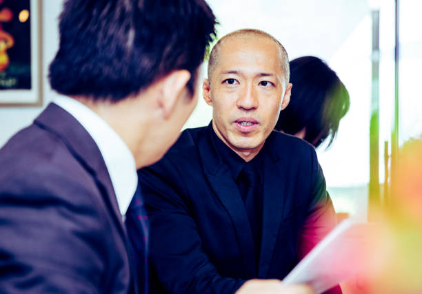 istock Restaurant owner giving his input to the financial advisor 918410822