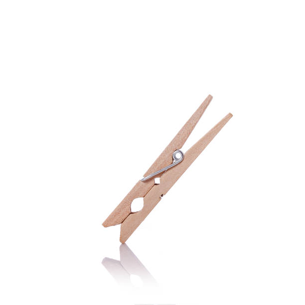 istock Wooden clothes pin. Studio shot isolated on white 918415040
