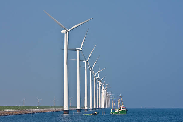 istock Windmills and fishing ship 91841713