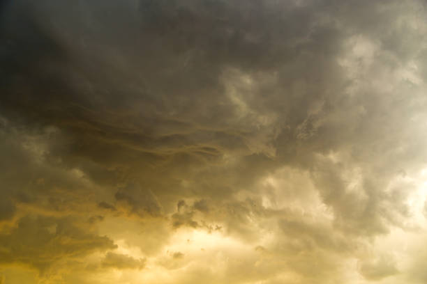istock Storm clouds in the sky at sunset as background 918418600