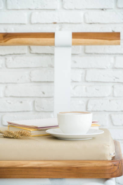 istock hot coffee with heart latte art shape on wood table 918418626