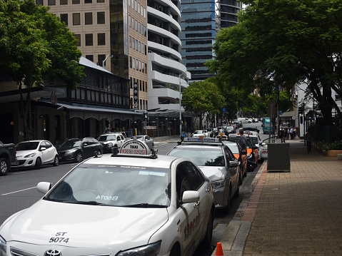 Taxis waiting on the rank in Edward Street outside the Stamford Plaza Hotel.