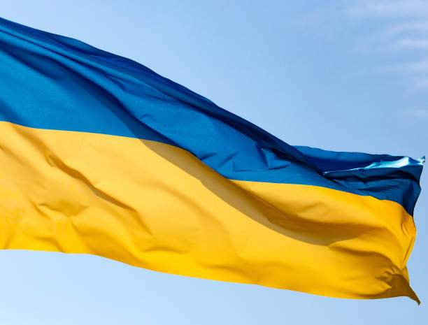 istock flag of Ukraine against the blue sky 918431036