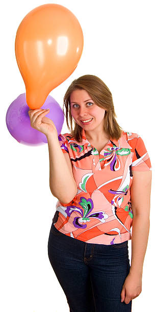 istock joyful woman with balloons 91843269