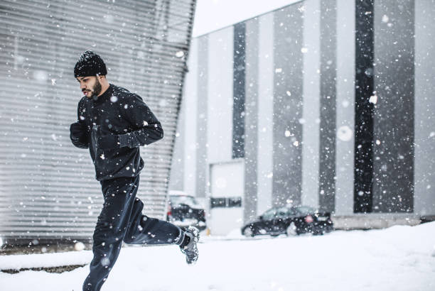 istock Male Athlete Exercising Outdoors in Winter 918448234