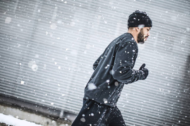 istock Male Athlete Exercising Outdoors in Winter 918448272