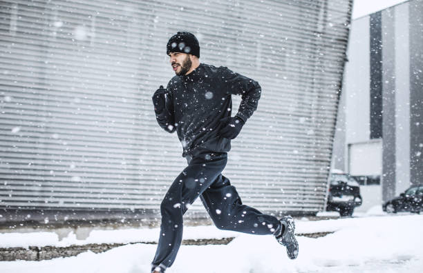 istock Male Athlete Exercising Outdoors in Winter 918448274