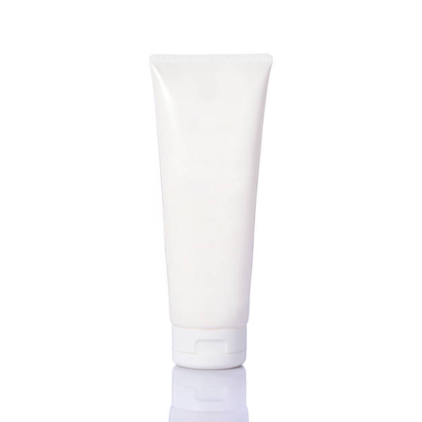 istock Blank white plastic bottle used for skin cream. Studio shot isolated on white 918450418