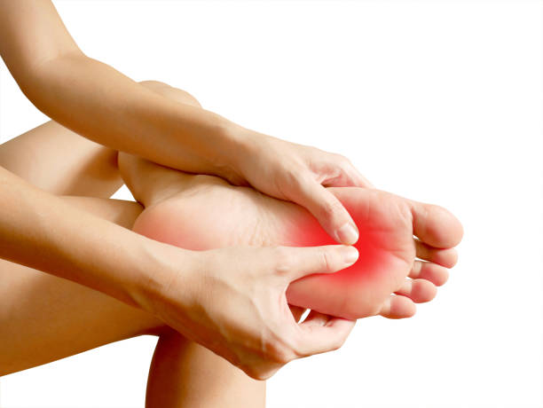 istock Woman suffering from foot pain 918450654