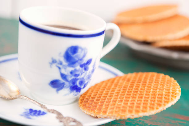 istock Cup of coffee with a Dutch stroopwafel cookie 918451808