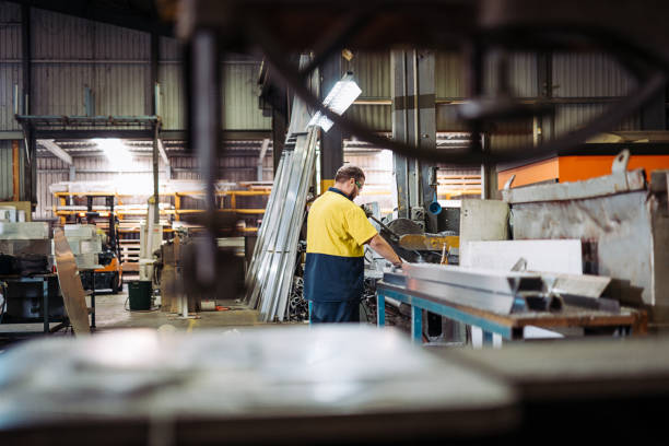 istock Hard-working employee working night shift in factory 918451904
